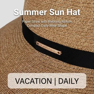 Elegant wide brim straw sun hat for women with black ribbon and gold metal buckle
