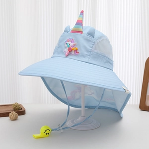 Detail of blue sun hat with mesh panels, unicorn horn, and yellow snail whistle