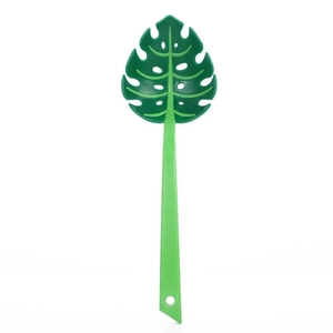 Green monstera leaf shaped kitchen slotted spoon strainer for noodles and pasta