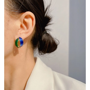 Vintage geometric enamel earrings featuring bold blue and green color-blocking on gold