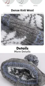 Detail of baby knit hat showing thick yarn texture and red white grey pompom design