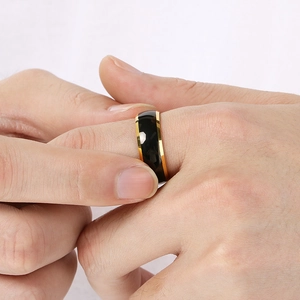 Faceted black tungsten ring with gold edges for men and women, polished minimalist style