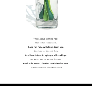 Close-up of creative cactus-shaped long handle cocktail stirrers in glass cups