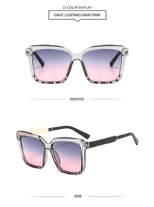 Detalle de gafas de sol cuadradas oversize leopardo gris con lentes degradadas
