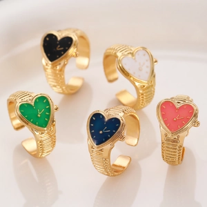 Macro shot of colorful heart-shaped dial rings with adjustable gold-plated bands