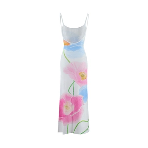 Detail of floral print maxi dress featuring thin straps and elegant open back design