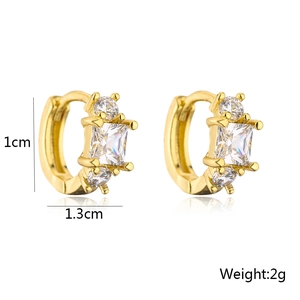 Detail view of gold hoop earrings with dimensions 1cm by 1.3cm and 2g weight specs