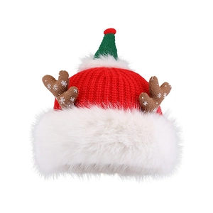 Red Christmas knit hat with brown reindeer antlers and white plush trim for winter warmth