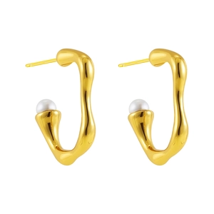 Close-up of C-shaped gold-plated stainless steel earrings with white pearl accents