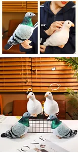 Detailed view of plush pigeon toys in white and grey held in hand and displayed on shelf