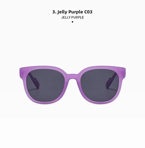 Detail view of stylish jelly purple round frame sunglasses with dark grey lenses