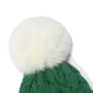 Detail view of the thick green knit stitching and white faux fur pom-pom on top
