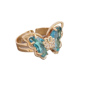 18K gold butterfly open ring featuring blue gradient gems and white zircon accents