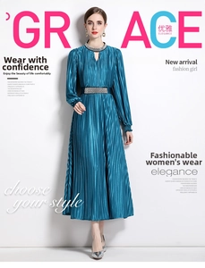 Detail of beaded hollow neckline and rhinestone belt on peacock blue pleated dress
