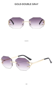 Detail view of rimless octagonal sunglasses with purple gradient lenses and gold arms