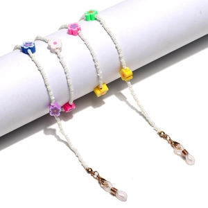 Colorful beaded eyewear chain with resin flower accents and golden lobster clasps