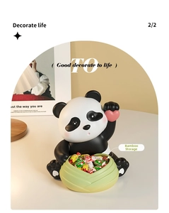 Close-up of cute panda figurine holding bamboo shoot bowl for storage and home decor