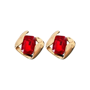Elegant gold-framed red square gemstone earrings set on a clean white background