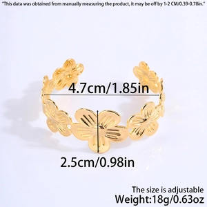 Detailed view of wide gold floral stainless steel cuff bracelet showing exact measurements
