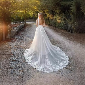 Elegant V-neck backless wedding dress with a long lace floral train in white mesh