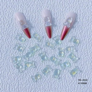 Detailed view of iridescent resin bear nail charms and size 8x10mm for DIY manicure art