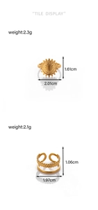 Detailed tile display of adjustable gold stainless steel sunburst and wheat texture rings