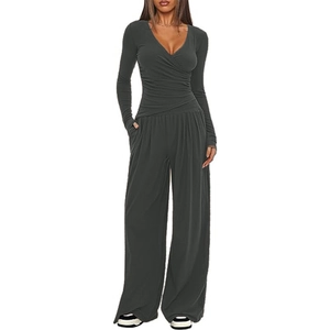 Detail of dark grey wide-leg trousers and V-neck top set with high elasticity fabric