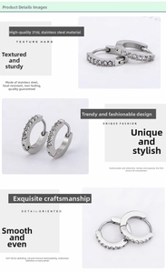 Macro detail of 316L stainless steel silver huggie earrings with inlaid cubic zirconia