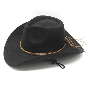 Detail of black suede cowboy hat featuring brown braided cord with gold beads and tassels