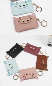 Multiple colors of cute animal-shaped PU leather coin purses with metal keychains