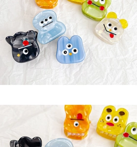 Close-up of colorful acetic acid mini hair clips with cute cartoon and marble patterns
