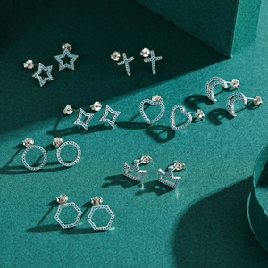 Handcrafted S925 sterling silver stud earrings with turquoise stones in star and moon shapes