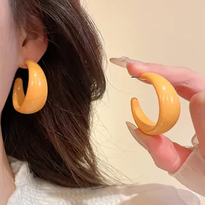 Minimalist large orange acrylic C-shape hoop earrings with silver needle posts for women