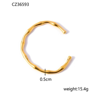 Detail view of gold-plated bamboo style bangle showing 0.5cm width and 15.4g weight
