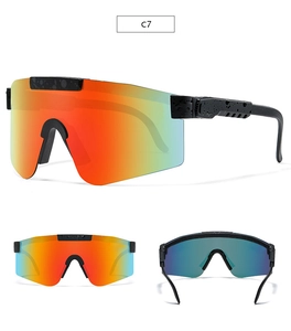 Detail view of sports sunglasses featuring gradient lens and black speckled frames