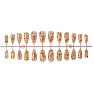 Tiger print almond false nails with pink floral accents and orange base tones, 24 count