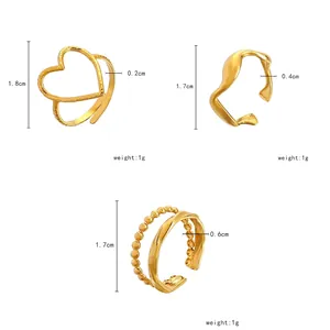 Set of three hollow heart-shaped titanium steel adjustable rings with hollow line designs