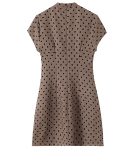 Detailed back view of sleeveless polka dot mini dress with hidden zipper closure