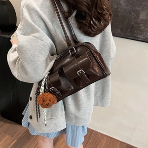 Brown vintage faux leather hobo shoulder bag with a cute plush bear pendant accessory