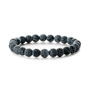 Close-up of black dragon vein agate beads with unique white crackle texture