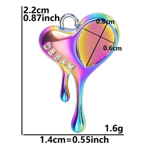 Rainbow stainless steel melting heart charm with Dream engraving and size measurements