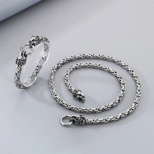 Detailed set of silver stainless steel square weave chain necklace and lion head bracelet