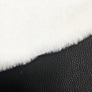 White faux rabbit fur Christmas tree skirt with premium textured black leather details