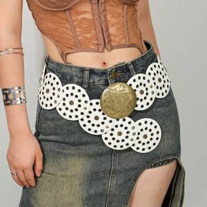 Detail of bohemian white round disk belt with vintage bronze sunflower carved buckle