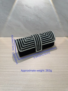 Sparkling black evening clutch bag with geometric rhinestone patterns and metal frame