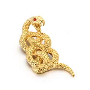 Golden snake pendant with red gem eye and detailed scales on a white background