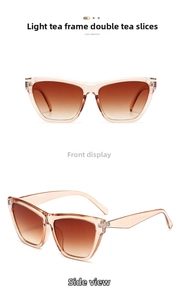 Detail of light tea cat-eye frame and gradient brown lenses with metal hinge