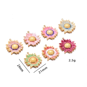 Detailed view of colorful enamel sunflower pendants with 24mm by 21mm size indicators