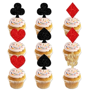 Glittery poker suits and dollar sign cupcake toppers for magic casino theme parties
