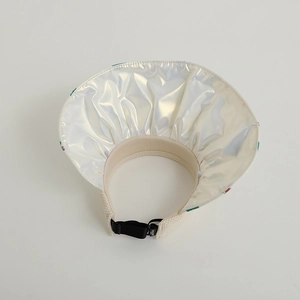 Detail of children sun hat featuring silver UV lining and adjustable black strap buckle